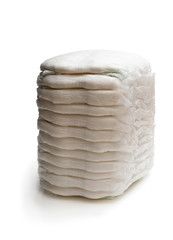 Stack of adult diapers isolated on white
