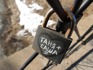 old padlock on the fence