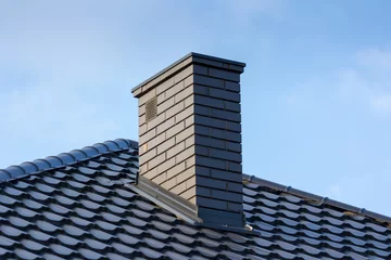 Foto op Aluminium roof and chimney © Alex White
