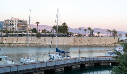 Obraz premium City of Pireas water front with sailboats and motor boats