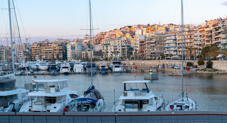 City of Pireas water front with sailboats and motor boats