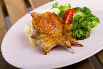 Grilled partridge with steamed vegetables