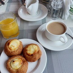 breakfast with coffee and croissant
