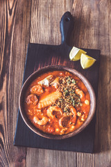 Portion of spanish fish and chorizo soup