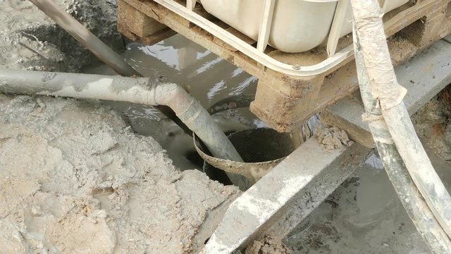During the creation of the well circulation of water from the bottom of the well. shovel cleans the dirt from the water filter.