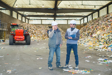 workers of recycling industrial plant