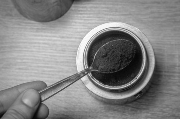 Black and white photo of custard coffee. In order not to fall asleep.
