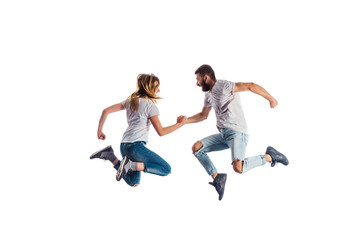 Couple jumping during training dances