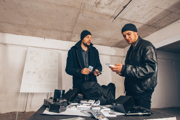 Thiefs counting stolen cash