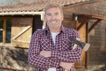 woodcutter outside his cabin