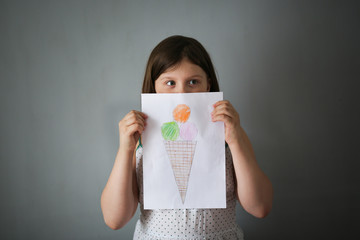 Girl with painted ice cream, dreams of sweet and summer