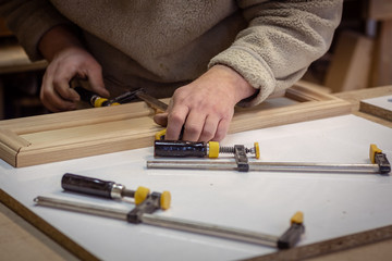 Making furniture from wood. Work carpenter. Carpentry tools.