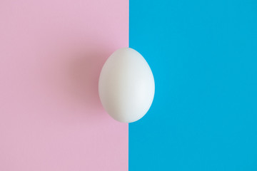 High angle view of an egg on colorful background abstract.