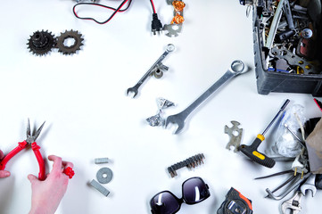 Top view of industrial working tools on table