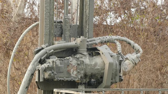 gray liquid flows out from under the gasket