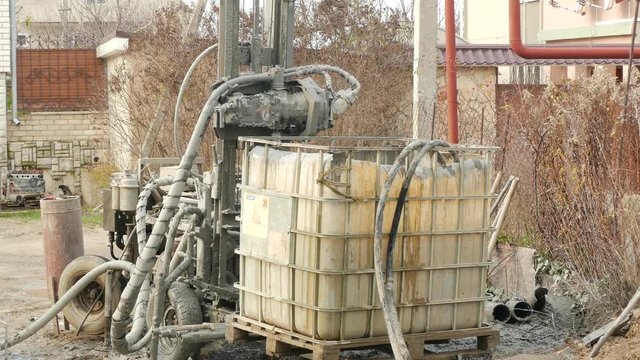 modified forklift into the device to create wells