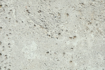 Gray concrete texture background. Damage. Cracked stone wall background.