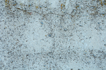Obraz premium Gray concrete texture background. Damage. Cracked stone wall background.