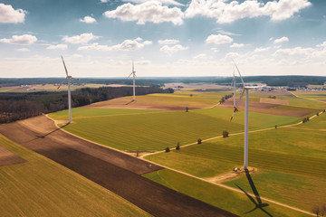 Wind turbines in a rural area on a cloudy day