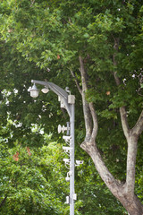 The pole on the street corner stands as unobtrusively as possible as its cameras record all...