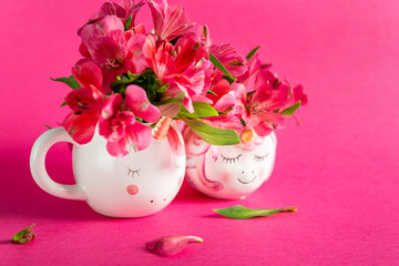 Unicorn mugs with Alstroemeria on bright pink background