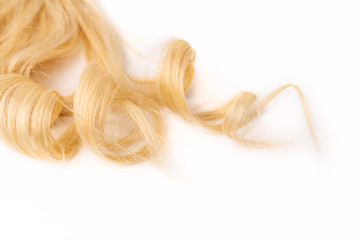 uman, natural light blond wavy hair on white isolated background. An example of a fashionable hairstyle for a poster, an advertisement or a hairdressing website. Extended, attached and beauty.