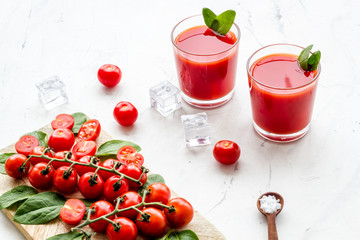 healthy drinks with tomato and ice for summer on white background