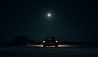 1965 Mustang convertible under the moonlight