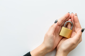 protect information from cyber attack with locker in hands on white background top view mockup