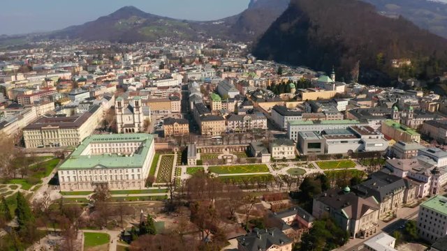 Aerial view of famous Mirabell Gardens with historic Hohensalzburg Fortress in the background on a sunny day in fall in Salzburg, Austria