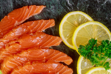 Delicious of healthy food on the plate salmon, lemon nutritious lunch or dinner.