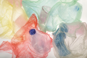 Single-use plastic waste, studio shot. Plastic pollution concept.