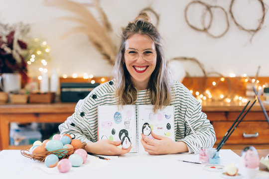 Woman preparing easter in the workshop