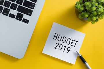 Top view of office desktop with Budget 2019 Concept