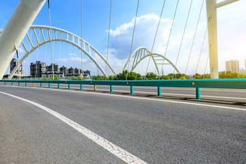 Empty asphalt road and bridge construction in shanghai