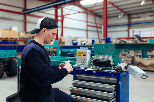 Reparing an engine in the factory.