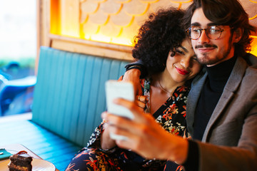 Lovers dining in restaurant.