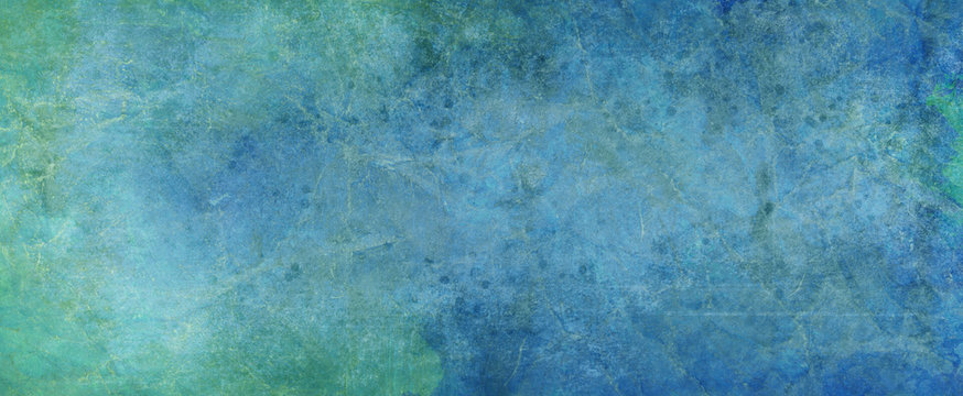 Old grunge design background with lots of texture on a faded green and blue painted shabby wall