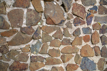Random pattern stone wall at Halloran's Hill Lookout Park  near Atherton in Tropical North Queensland, Australia