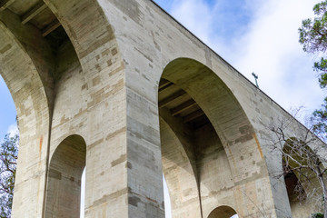 Fototapeta na wymiar Pylons and Archways under a bridge