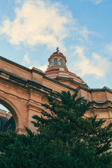 Maltese architecture church dome at sunset