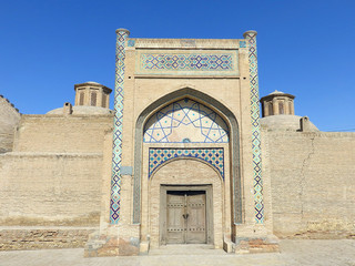 Fototapeta na wymiar Mir-i-Arab Madrasah, UNESCO World Heritage Site in Bukhara, Uzbekistan. Mir-i Arab Madrasa at the Poi Kalyan complex
