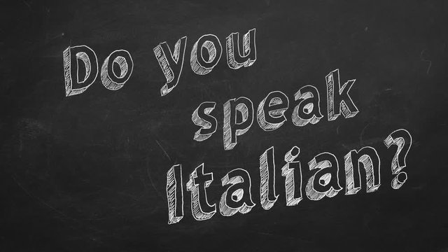 Hand drawing "Do you speak Italian?" on blackboard. Stop motion animation.