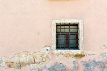 Fototapeta na wymiar Window in a cracked wall; in horizontal orientation