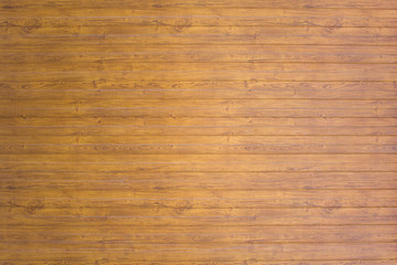 yellow gray wooden plank fence. horizontal lines. rough surface texture