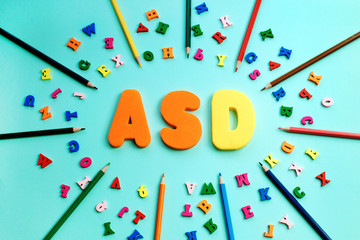 ASD. Autism spectrum disorder from color letters and color pensils, World Autism Awareness Day, April Autism awareness month