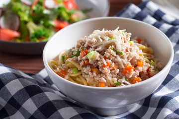 Spaghetti with rabbit sauce, typical Italian pasta, close-up