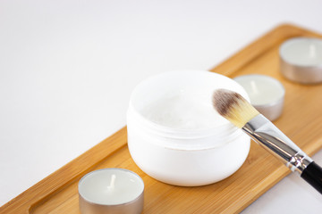 Cosmetics flat lay on white background