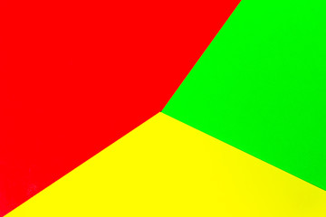 Vibrant multicolor background from cardboard of different colors. Color paper for background. Colorful abstract geometric shapes. Minimalist design for minimal background. Colorful background.