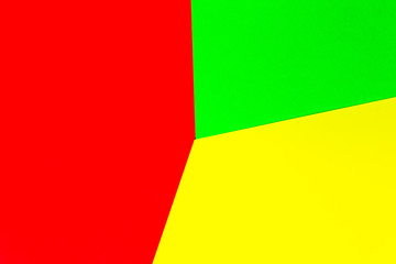 Vibrant multicolor background from cardboard of different colors. Color paper for background. Colorful abstract geometric shapes. Minimalist design for minimal background. Colorful background.